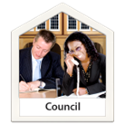Photosymbol image of two people at a desk