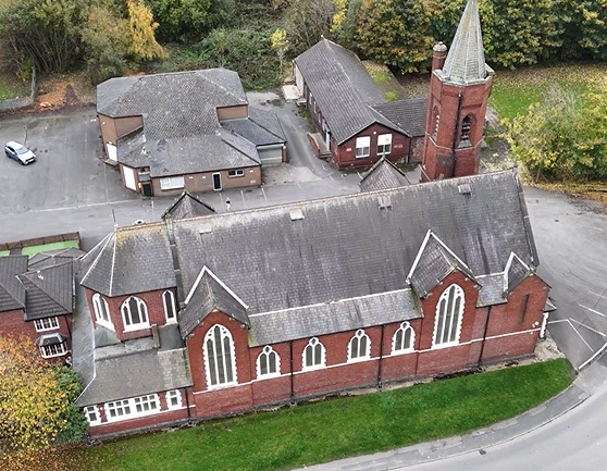 Aerial shot of a local building. It could be a school.